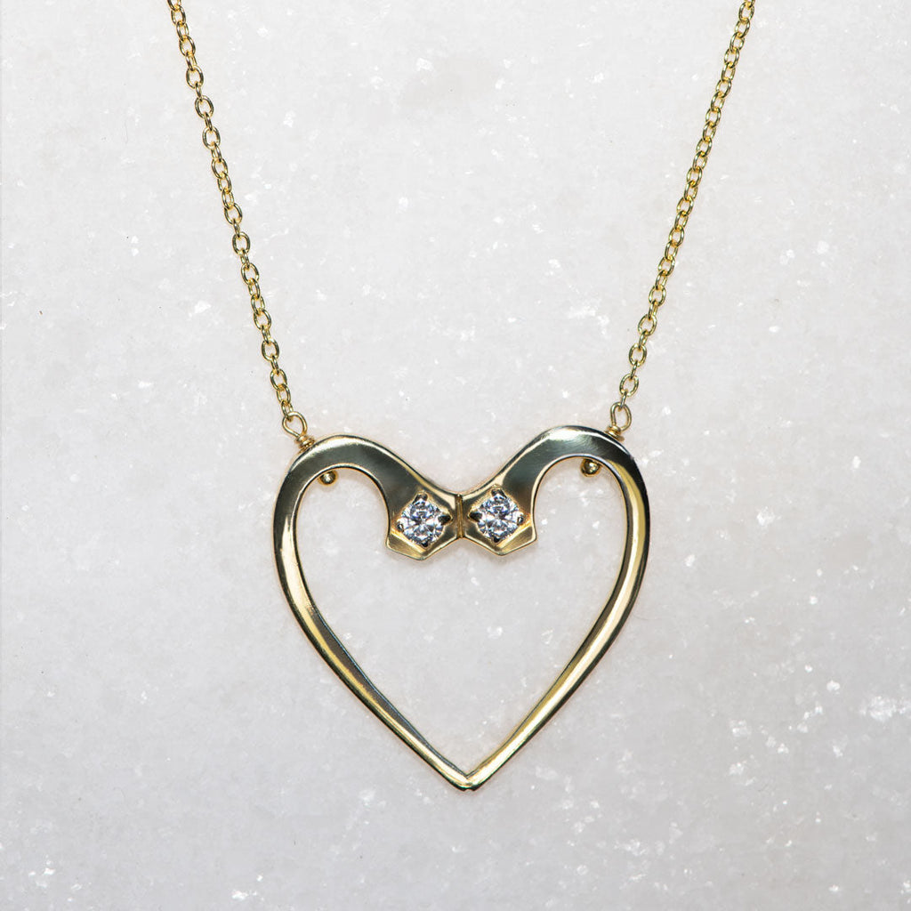 Charmed - Mossanite Equestrian Horseshoe Nail Head Necklace in Gold