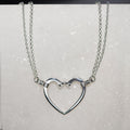 Ava - Equestrian Horseshoe Nail Heart Necklace in Silver