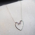 Charmed - Mossanite Equestrian Horseshoe Nail Heart Necklace in Silver