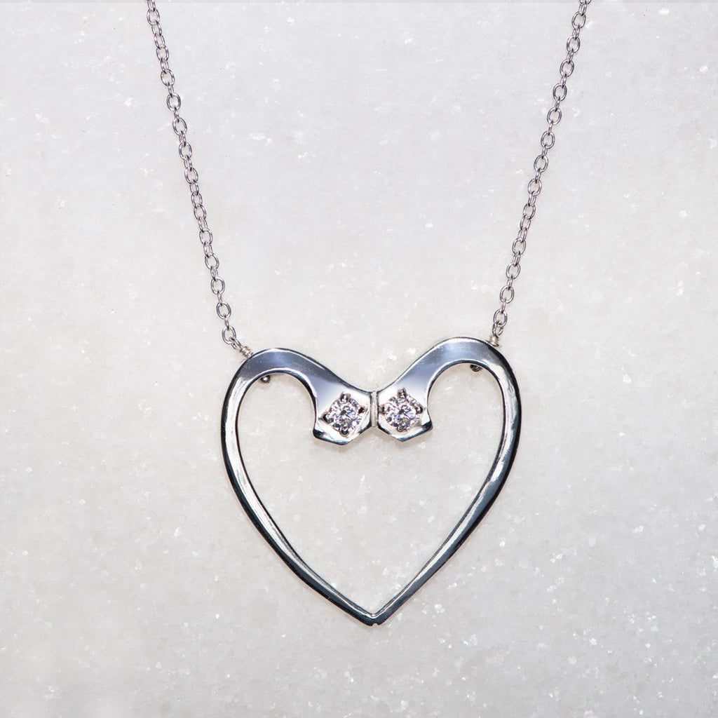 Charmed - Mossanite Equestrian Horseshoe Nail Heart Necklace in Silver