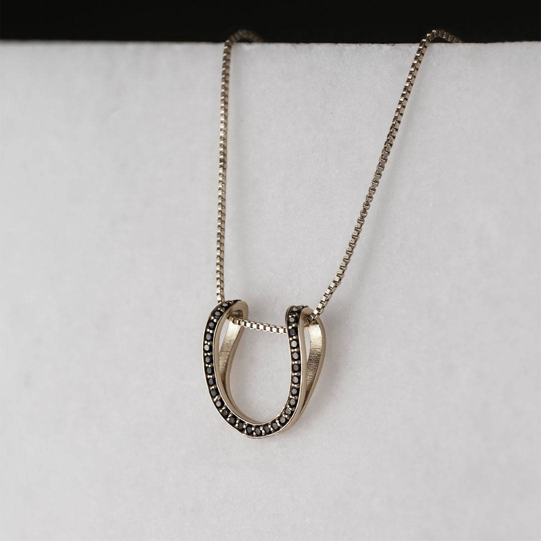 Levade -Black Moissanite Horseshoe Equestrian Necklace in Silver